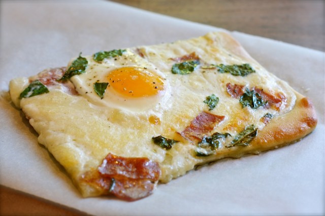 a slice of Pizza Carbonara